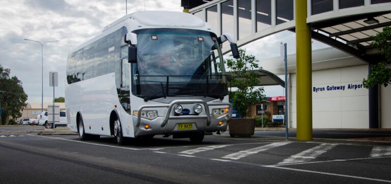 Charter coach parked at the airport for an airport transfer